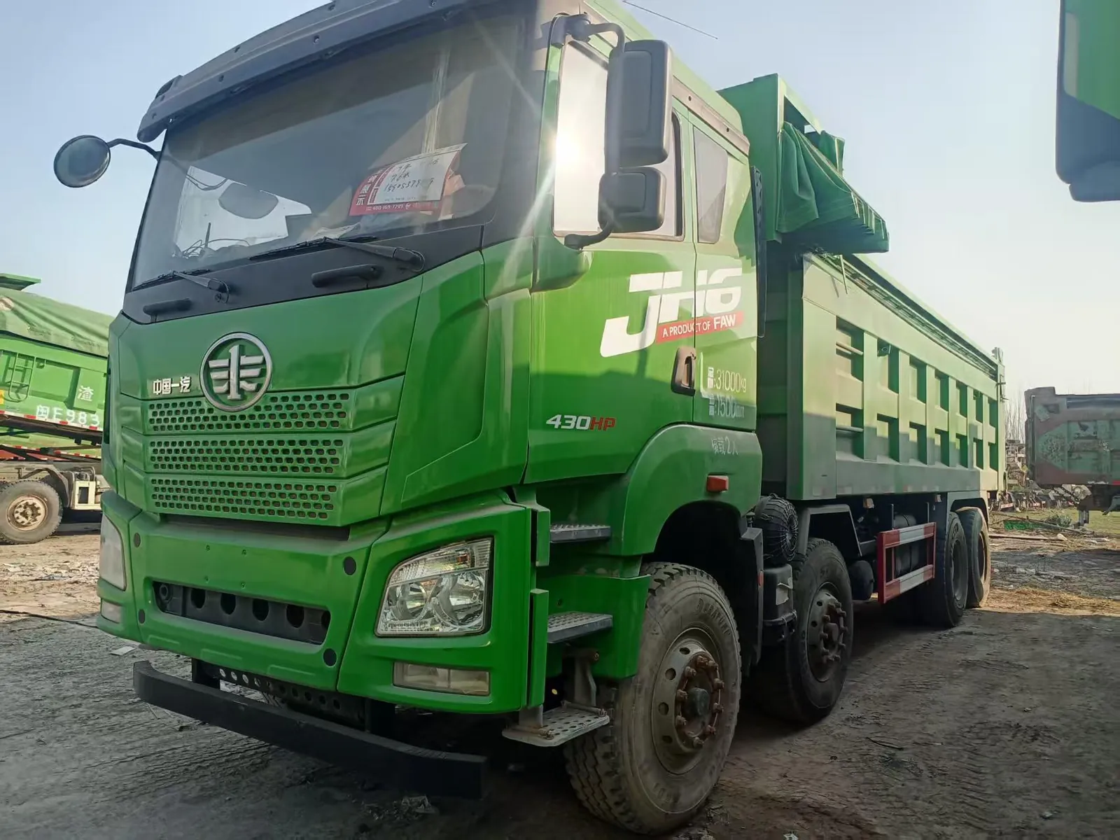 Used FAW JH6 8x4 dump truck, exterior view