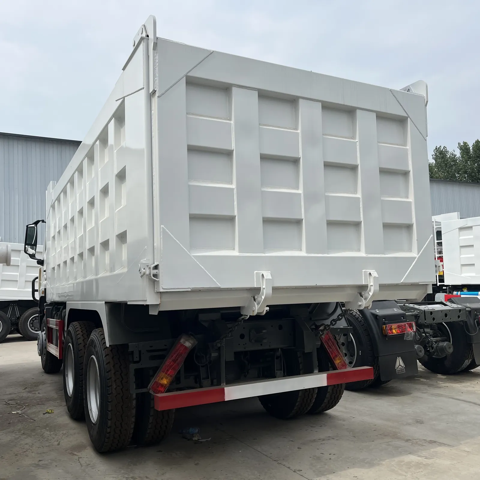 Used HOWO NX 6x4 dump truck, rear-left