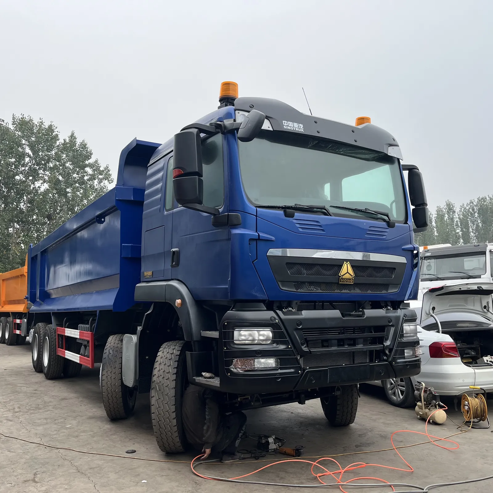 Used HOWO TX 8x4 dump truck, front-right